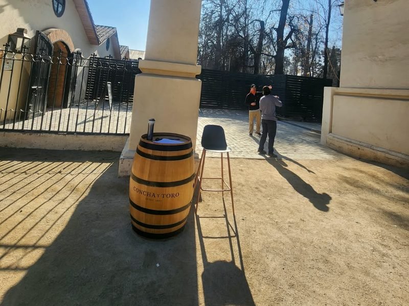 Entrance courtyard at Concha y Toro winery with a wine barrel, Chile