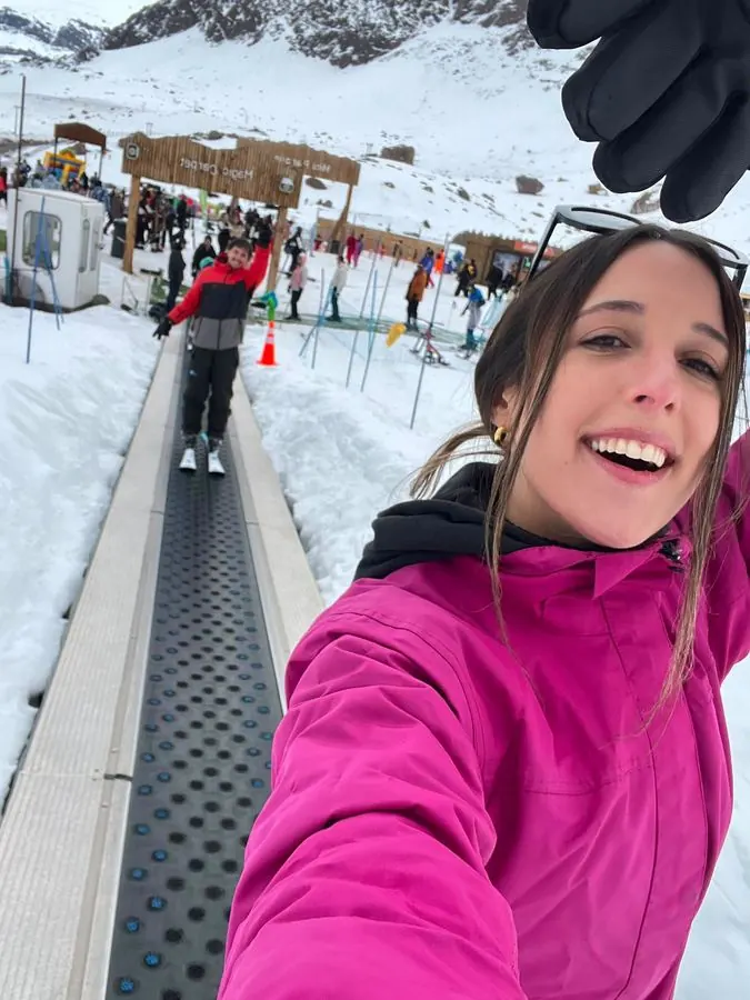 Travelers on the beginner slope of a ski resort